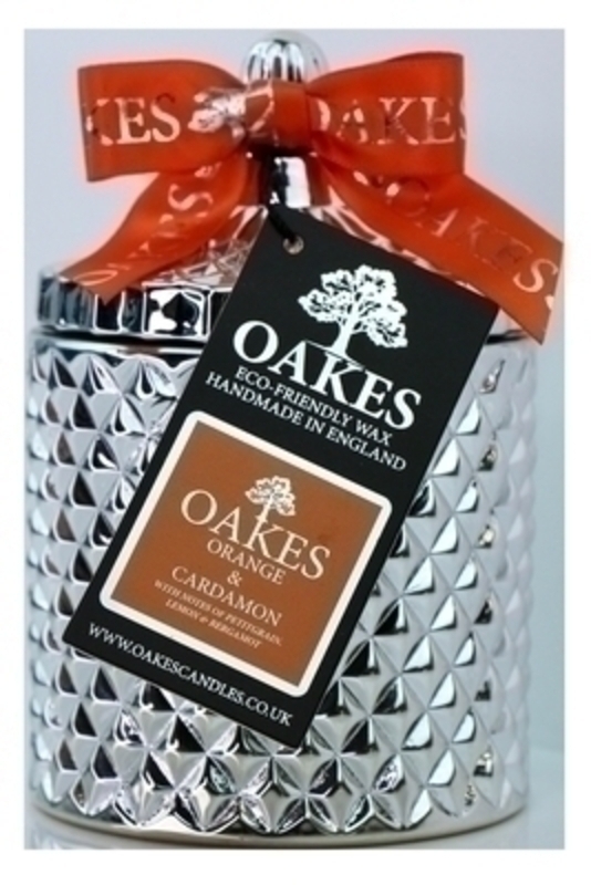 <p>Oakes Vegan artisan luxury scented candle for your home in a stylish jar. Made locally in Liverpool. Cut glass candle jar in Orange and Cardamon scent. Oakes candle votive comes in a beautiful chic repurposeable white cut glass jar with lid and branded decorative bow. Eco-Friendly made from soy wax blend from a renewable and sustainable source and has an approx burn time of 45 hours+</p>